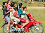 Child driving motorbike