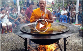 Thai Monk Meditates in Pot of Boiling Oil